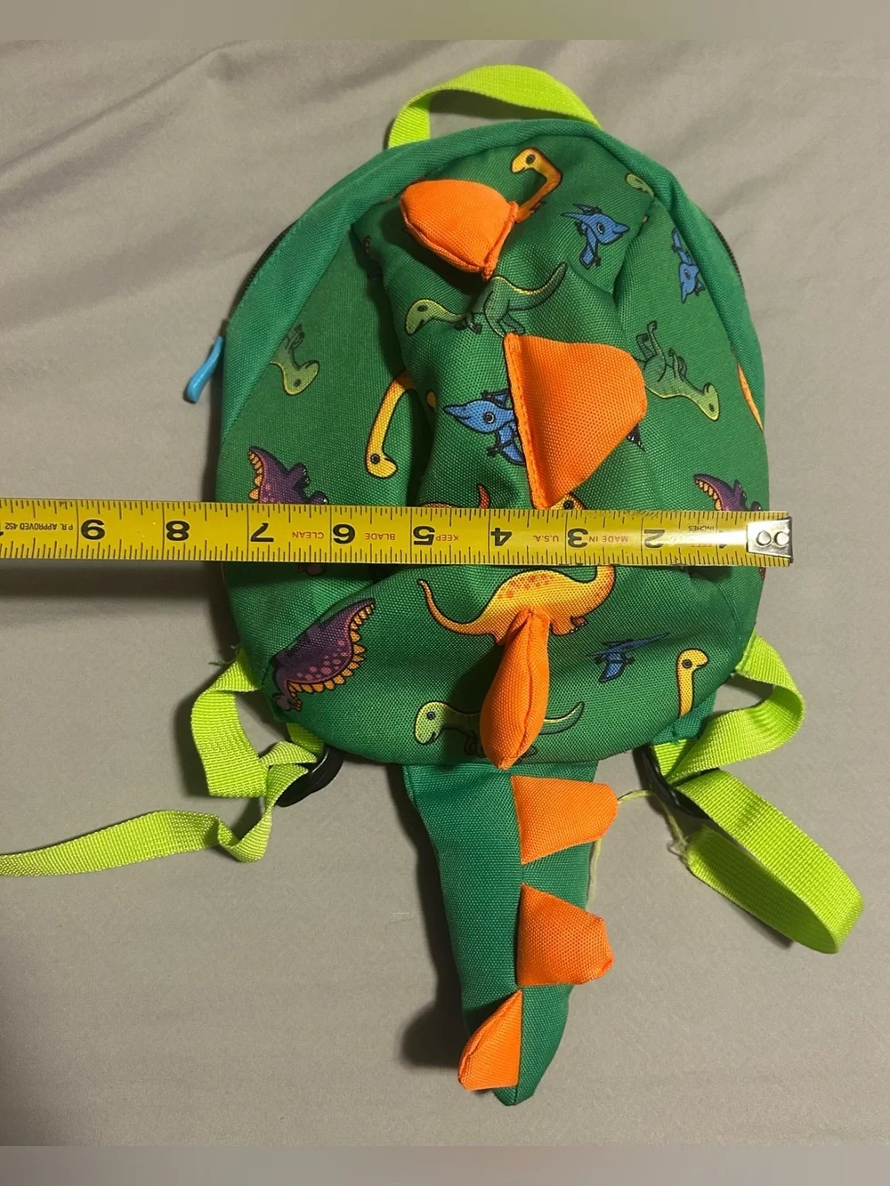 Green Kids Dinosaur Backpack with Orange Spikes